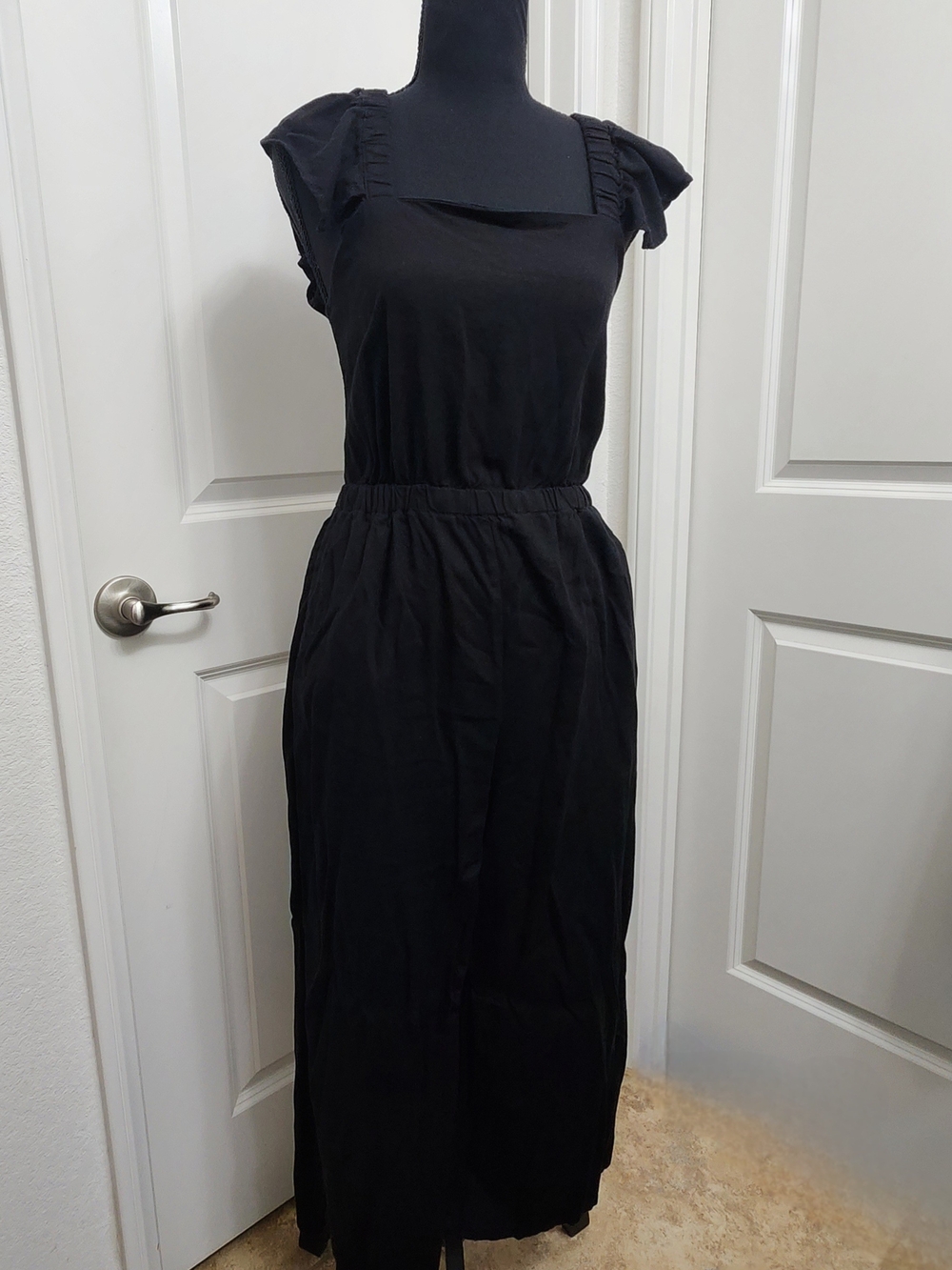 Blue Rain Black Sleeveless Ruffled Shoulder Jumpsuit